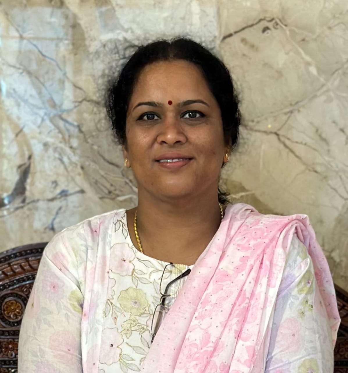 Dr. Aruna S K